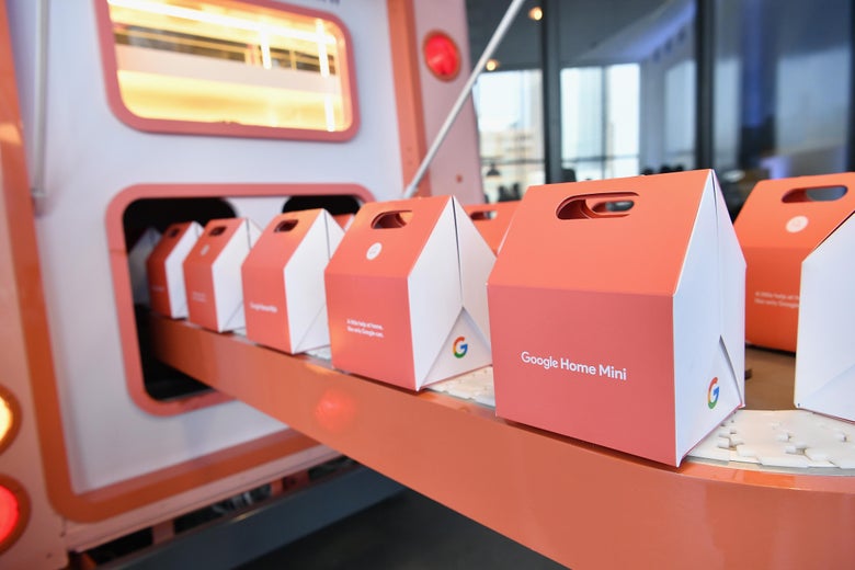 Google Home Minis on display.